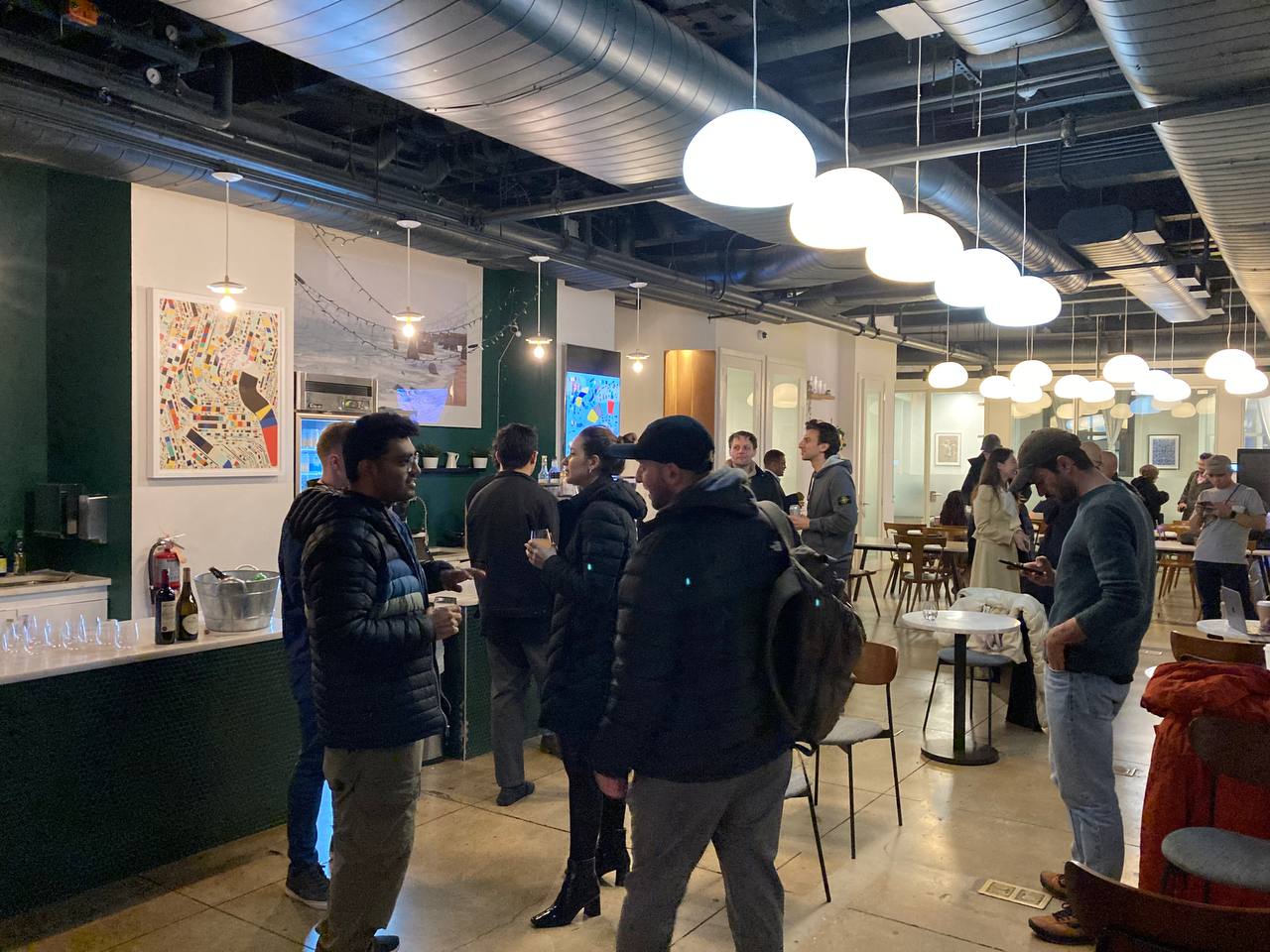 A picture of attendees mingling at Station3.